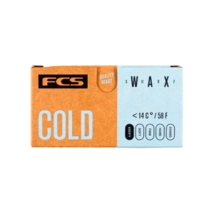 Shapers-Club- A rectangular can of FCS - Wax - Cold labeled "COLD" in large white letters on a light blue and brown background. The can indicates that it is suitable for temperatures below 14°C or 58°F and features the words "QUALITY PEARLS" and "SWARXF". -surfshop-surfboard