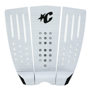 Shapers-Club- The CREATURES - PAD - RELIANCE 3 CORD from the Creatures collection is a white surfboard tail pad featuring a textured surface with cut-out slots. It features multiple perforations in the midsection and displays a stylized "C" logo top center, embodying reliability and performance. -surfshop-surfboard